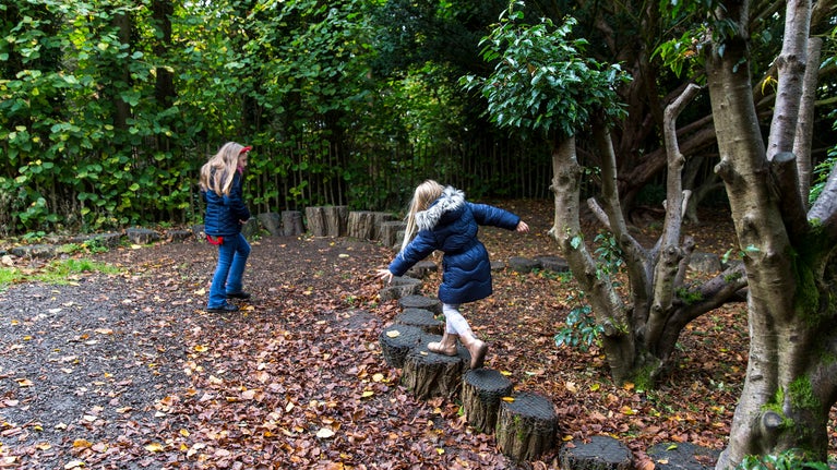 Children playing in the play area at Nunnington Hall, North Yorkshire